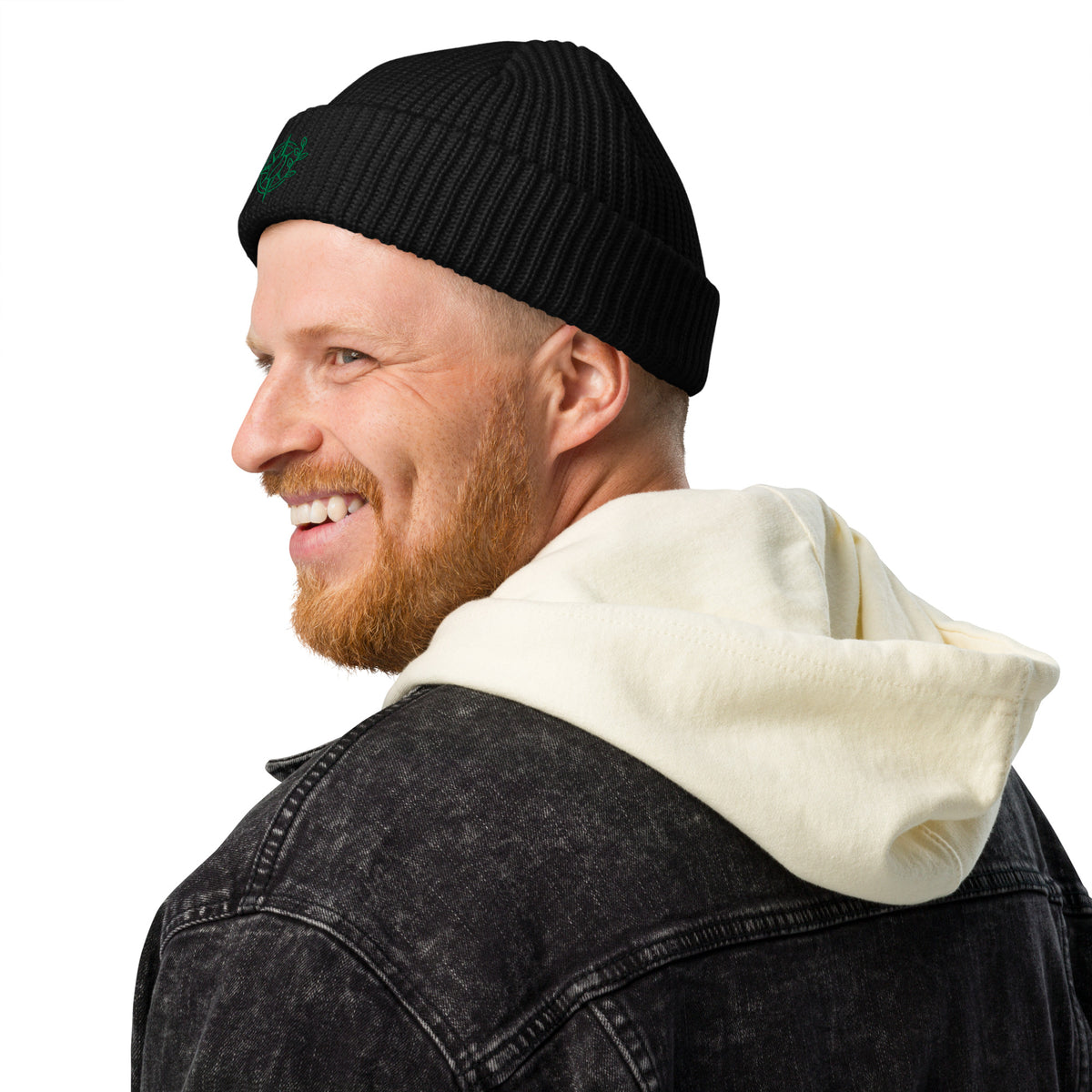 Man wearing a black beanie and denim jacket with a white hood on a white background