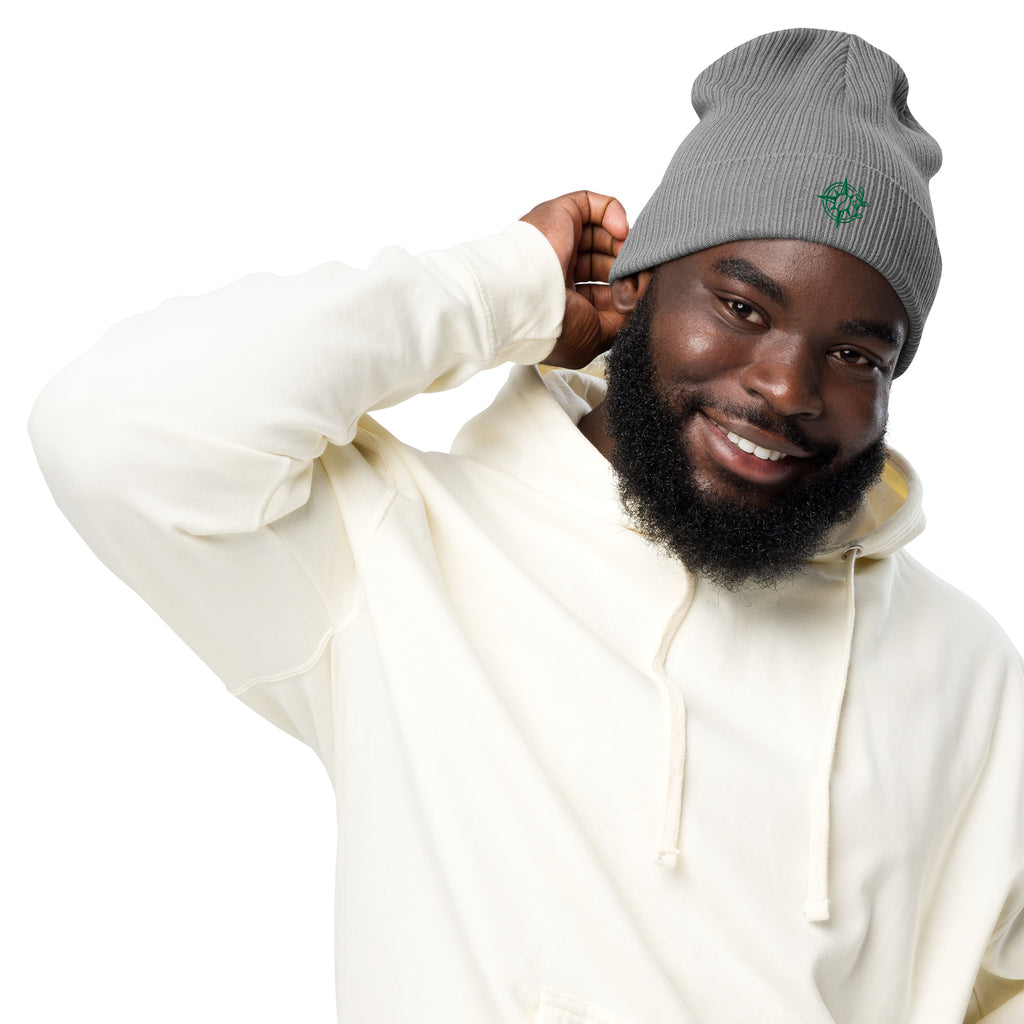 Man wearing a gray beanie and white hoodie on a white background