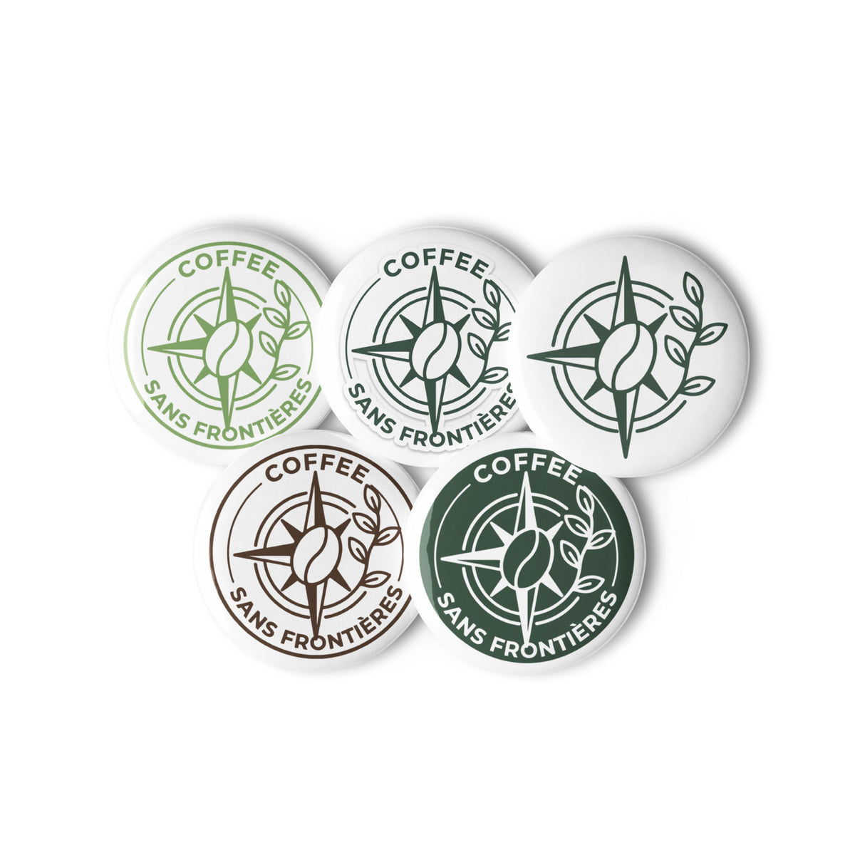 Five round white buttons featuring the 'Coffee Sans Frontières' logo in various green, brown, and dark green shades, arranged on a plain white background.