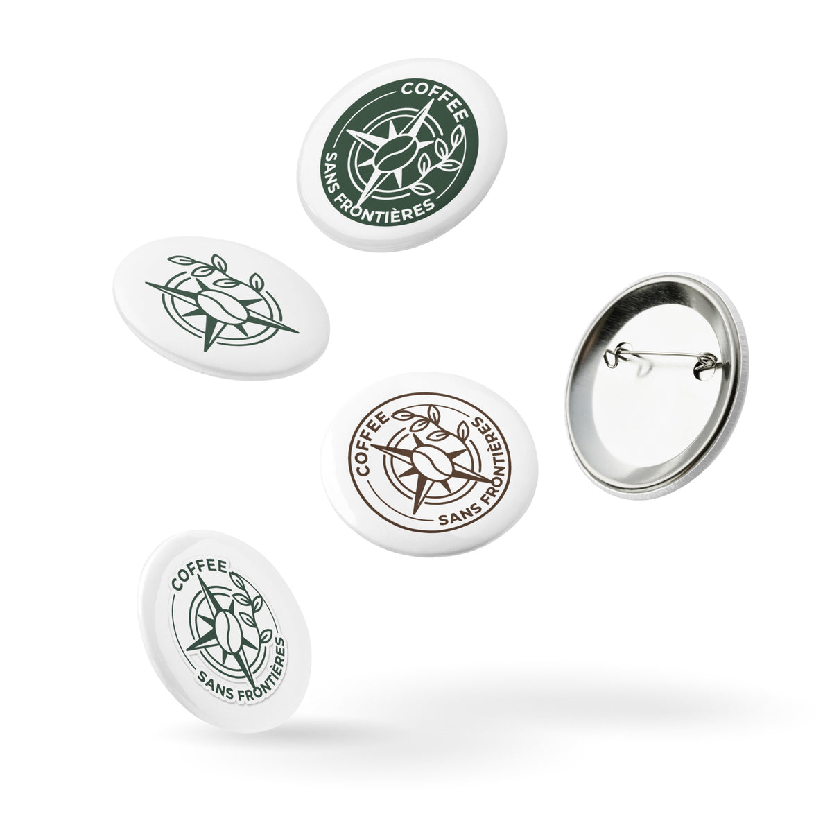 Five round pin-back buttons with the Coffee Sans Frontières logo, shown in white, green, and brown designs, with one button displaying its metal pin-back backing, on a white background.