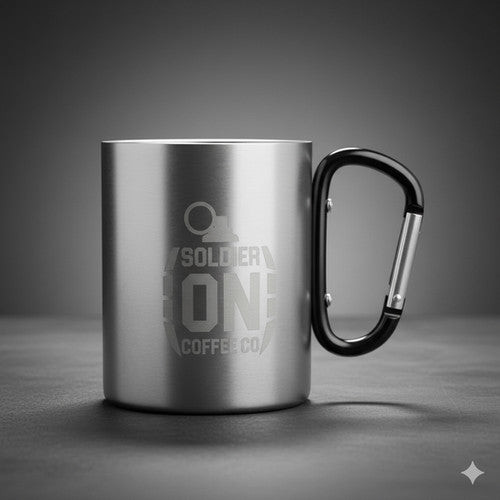 Soldier On Coffee Co stainless-steel mug with an engraved logo and black carabiner handle.